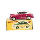 A Dinky Toys 159 Morris Oxford, two-tone issue, cream upper body, cerise lower body, beige hubs,