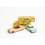 A Dinky Toys 132 Packard Convertible, tan body, red interior and hubs, 172 Studebaker Land
