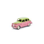 A Dinky Toys 152 Austin Devon, two-tone issue, lime green upper body, cerise lower body, cream hubs,