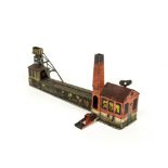 Early Arnold Tinplate Clockwork Coal Mine Toy, detailed tinprinted toy with Coal Wagon moving