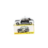 A French Dinky Toys 1450 Simca 1100 Police Car, dark blue/white body, brown interior, concave