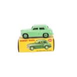 A Dinky Toys 154 Hillman Minx, pale green body and hubs, in original box, E, some small paint