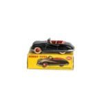 A Dinky Toys 106 Austin Atlantic Convertible, black body, red interior and hubs, in original box, E,