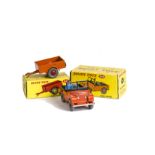 A Dinky Toys 340 Land Rover, orange body, dark green interior, blue driver, red plastic hubs, with
