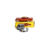 A French Dinky Toys 24y Studebaker Commander, orange body, tan roof, plated convex hubs, in original
