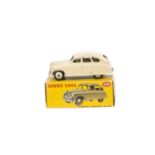 A Dinky Toys 153 Standard Vanguard, cream body and hubs, in original correct tan spot box, VG, box G