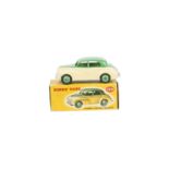 A Dinky Toys 159 Morris Oxford, two-tone issue, green upper body and hubs, cream lower body, in