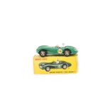 A French Dinky Toys 506 Aston Martin DB3S, green body, concave hubs, white driver, RN16, in original