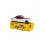 A Dinky Toys 157 Jaguar XK120 Coupe, two-tone issue, turquoise lower body, cerise upper body and