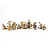 Fourteen Goebels Hummels Figures of children engaged in various pursuits, to include Star Gazer