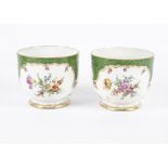 A pair of Dresden pot pourris or planters, with the green scale pattern, gilt surround and hand