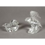 Two Swarovski figures, the first "Save me" "The Seals", with certificate length 10.5cm, the second