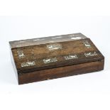 A 20th Century rosewood writing slope, decorated with mother of pearl carvings of unicorns and