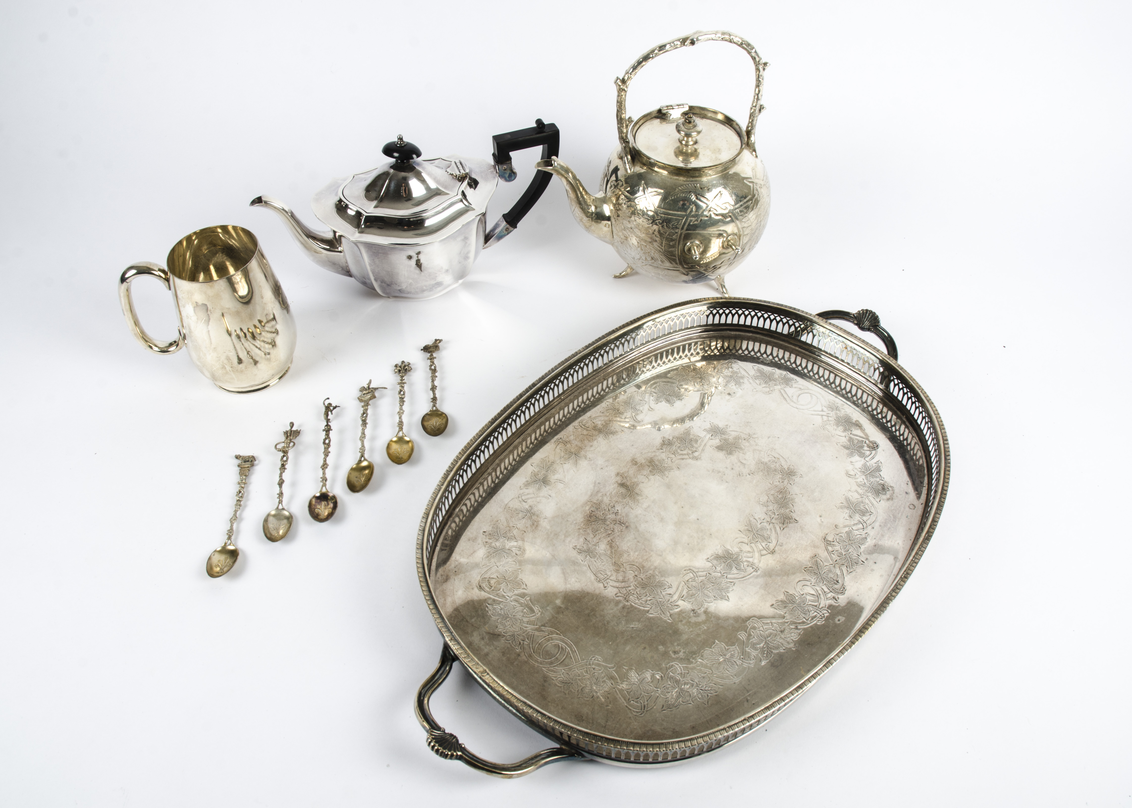 A large collection of 20th Century silver plate, including a boxed set of six spoons, each bearing