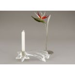 Two boxed Swarovski crystal ornaments, a shooting star candlestick holder in original box with an