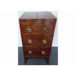 A Regency mahogany commode / washstand, with double rising top, false frieze drawer above a single