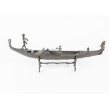 A bronze sculpted gondola with gondolier, on a metalwork stand, length 51 cm, potentially could be