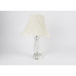 A heavy cut glass table lamp with shade, height of lamp 30cm,