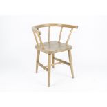 A child's beech and elm stick back arm chair, height 48cm,