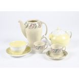A Susie Cooper 'Eddon' pattern coffee service, no.1574, consisting of six cups and saucers, a