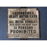 A vintage cast iron restriction sign, Locomotives, heavy cars and all other motor vehicles' Road act