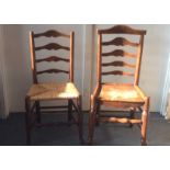 An 18th Century elm ladder back chair, with solid seat, together with a later rush example (2)