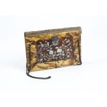 A fine late 19th Century lady's tortoiseshell purse, rectangular in form, the central panel on