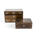 An antique treen jewellery box with mother of pearl inlaid decoration and escutcheon, with red inner