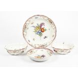 A large 19th Century Meissen dish, together with two bowls and a further dish, all from the same