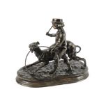 A 19th Century animalier school bronze sculpture of a boy playing with a greyhound, cast from a