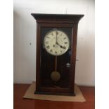 A 20th Century time recorder clock by the 'Gled Heil Recordings Ltd', oak cased, white dial with