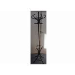 A contemporary stained beech wooden hat stand, height 188cm