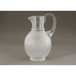 A Lalique of France globular shaped jug with opaque body and clear handle and spout, 20th Century,