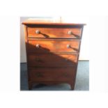 A 20th Century mahogany chest of drawers, four long graduated drawers, raised on front splayed feet,