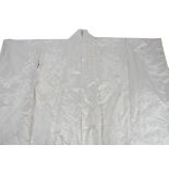 A late 19th/early 20th Century Japanese kimono, heavy white satin embroidered with birds and flowers