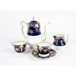 A 20th Century Royal Crown Derby coffee set, comprising of a coffee pot, sugar bowl, milk jug and