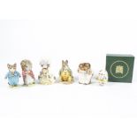 A group of Beswick figures form the Beatrix Potter Peter Rabbit stories, with gold backstamps, to