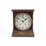 A late Victorian Winterhalder and Hofmeier mantle clock, the silvered dial with Arabic numerals,