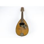 An early 20th Century Italian mandolin, with paper label internally, 61 cm long