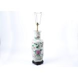 A large late 19th Century Chinese famille rose baluster vase, converted to a lamp, decorated with