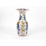 A large early 20th Century Japanese vase, baluster shape with a fluted rim, decorated with