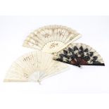 Three late 19th/early 20th Century folding fans, one with an ivory gorge and guards, satin leaf