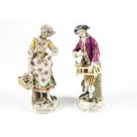 Chelsea gold anchor period (1756-1769) a pair of soft paste porcelain figures, both on rococo gilt