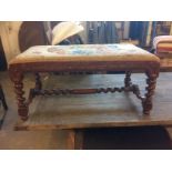 Victorian Duet Stool, an oak stool/window seat with floral tapestry top on barley twist supports and