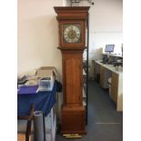 A modern oak long case clock, having gilt and silvered dial, probably eight day movement, with chime