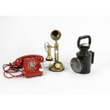 A 1967 706 red telephone, together with a vintage styled brass candle phone, with a rotary dial