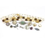 A quantity of 20th Century costume jewellery, including brooches, necklaces, rings, pendants,