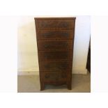 An Edwardian mahogany chest of drawers, cross-banded top with boxwood stringing, six graduated