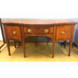 A Georgian mahogany serpentine front sideboard, cross-banded and boxwood stringing to top, one oak