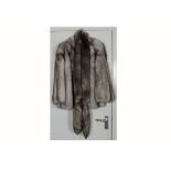A Vintage arctic fox fur coat for Grosvenor at Harrods, with a silver fabric lining, armpit to